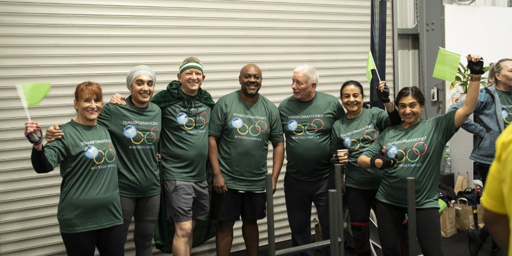 tf_green Group of over-40s clients at Transformation Fit Leicester celebrating in the gym in green shirts