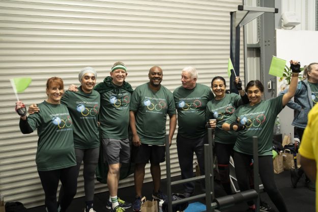 tf_green Group of over-40s clients at Transformation Fit Leicester celebrating in the gym in green shirts