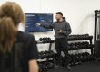 Strength training over 50 in Leicester: coach explaining the session plan at Transformation Fit