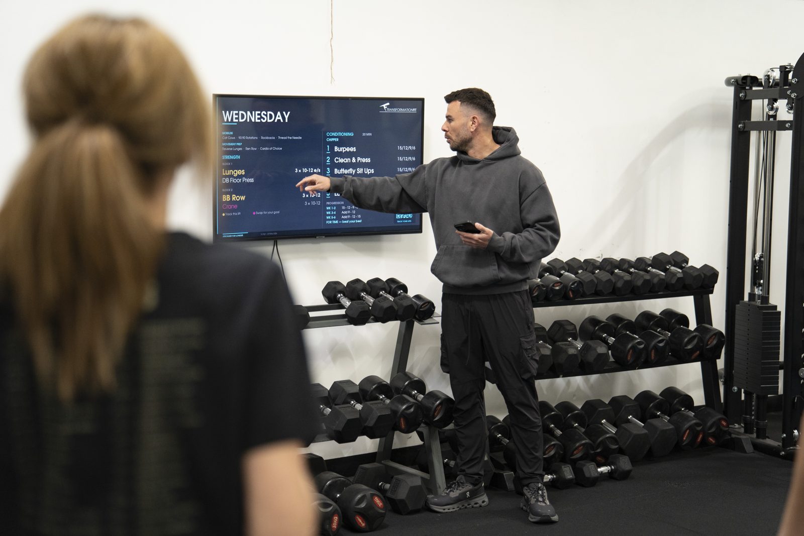 Strength training over 50 in Leicester: coach explaining the session plan at Transformation Fit